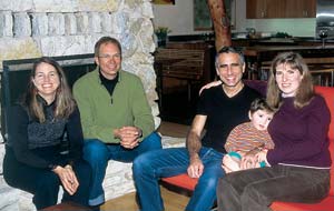 Architects Cate Leger and Karl Wanaselja (left) relax with Rob, Suzanne and their son, Dean.